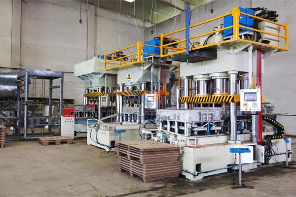 Línea de producción de palets de madera prensada